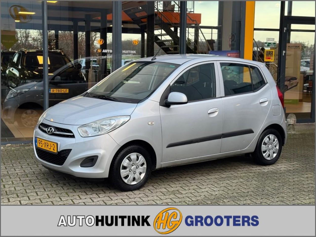 Hyundai i10 - 1.1 i-Drive Cool - airco - 5drs - all season - AutoWereld.nl