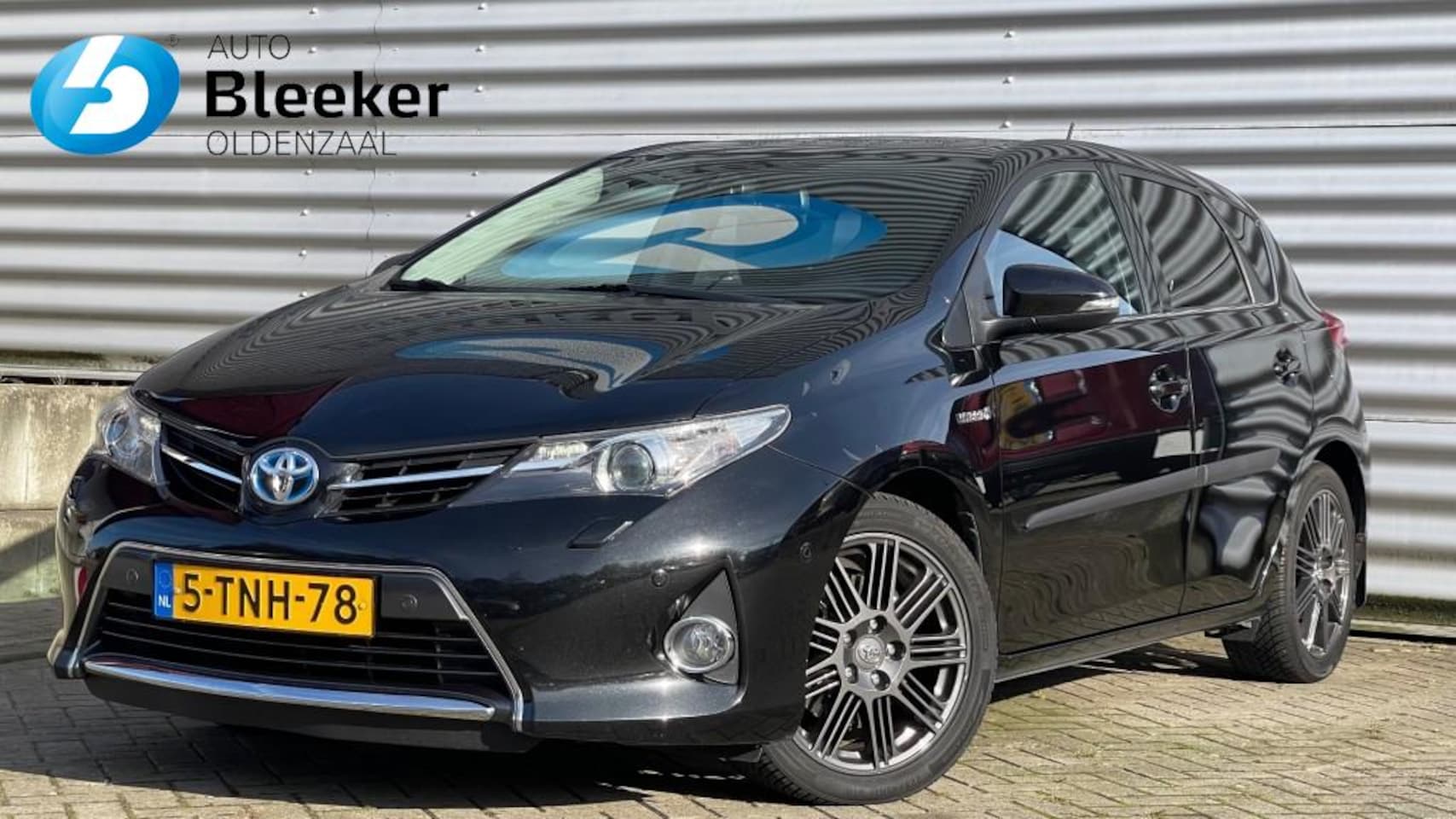 Toyota Auris - 1.8 Hybrid Lease Pro Navi Clima Cruise Pano - AutoWereld.nl