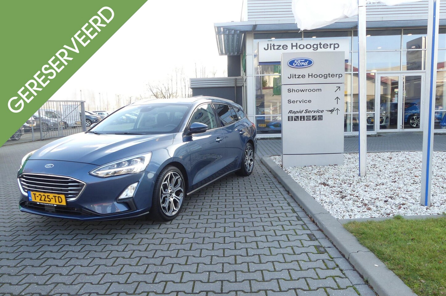 Ford Focus Wagon - 1.0 EcoBoost Titanium Business AUTOMAAT.NAVI.ADAPTIVE CRUISE.TREKHAAK.WINTERPACK.ELEKTR A - AutoWereld.nl