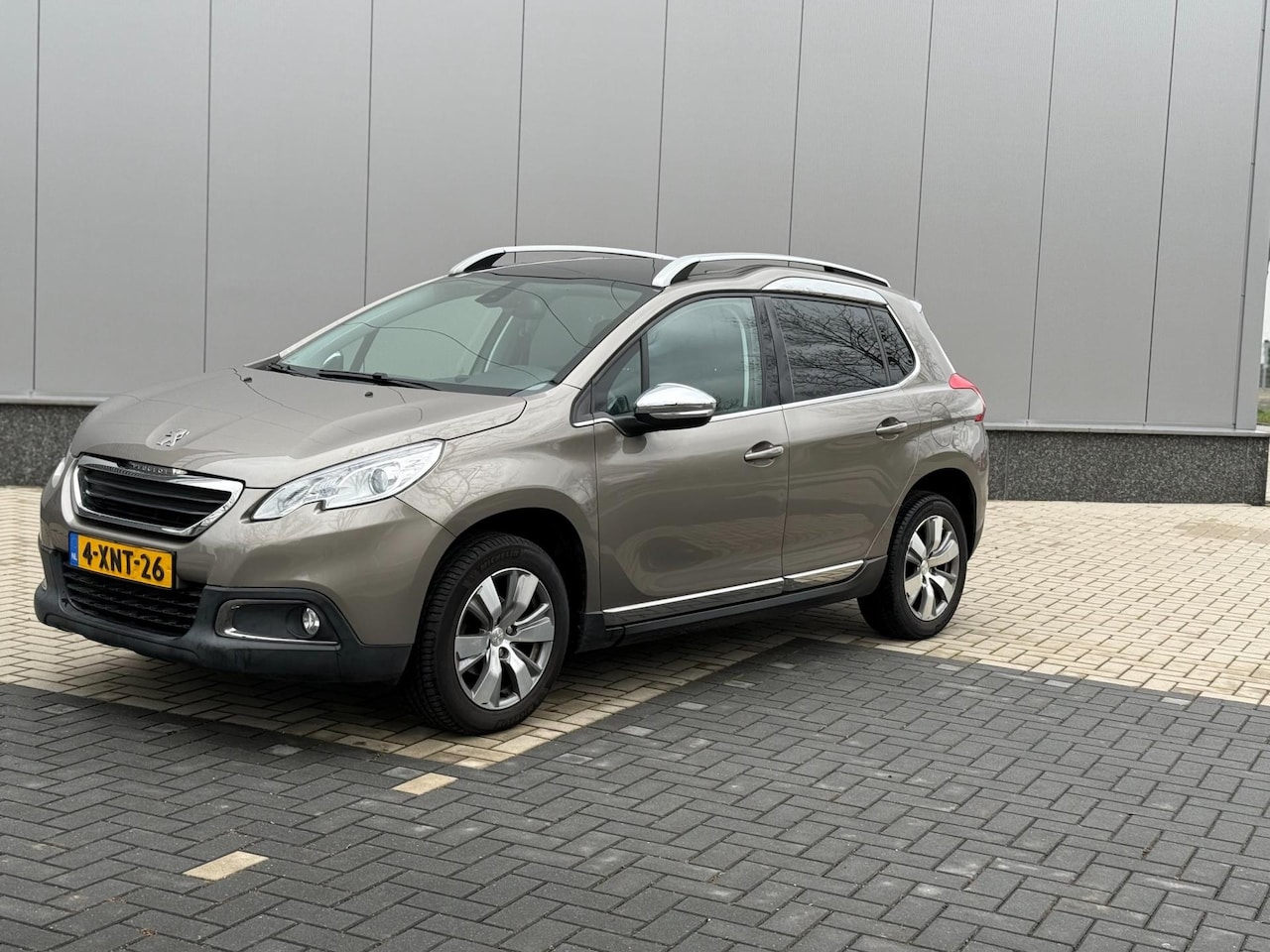 Peugeot 2008 - 1.2 PureTech Allure / Automaat / Pano - AutoWereld.nl