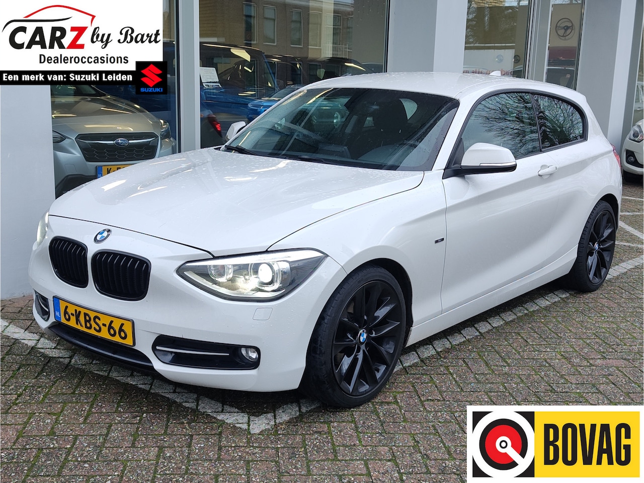 BMW 1-serie - 114i EDE BUSINESS SPORT Navi | Cruise | Xenon | Clima - AutoWereld.nl