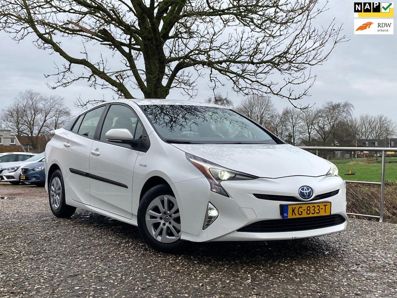 Toyota Prius - 1.8 Aspiration |1e eigenaar + Cruise + Clima + Navi nu € 11.975,-!!! - AutoWereld.nl