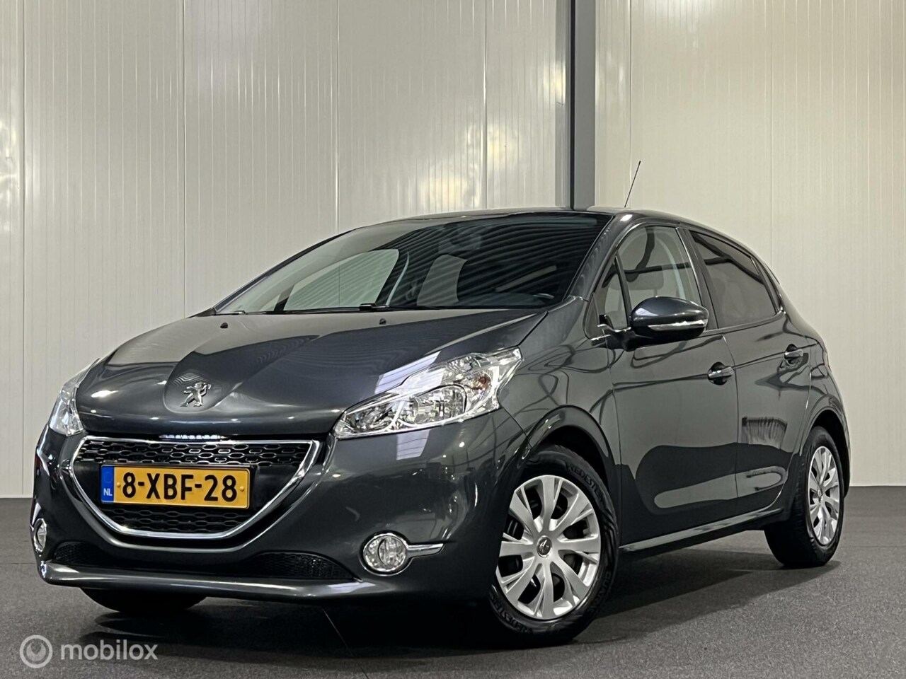 Peugeot 208 - 1.6 e-HDi 5-drs [ NAP navigatie cruise ] - AutoWereld.nl