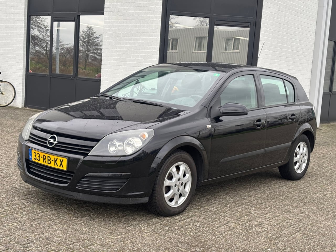 Opel Astra - 1.6 Enjoy Airco! 219DKM! NAP! Zwart! - AutoWereld.nl