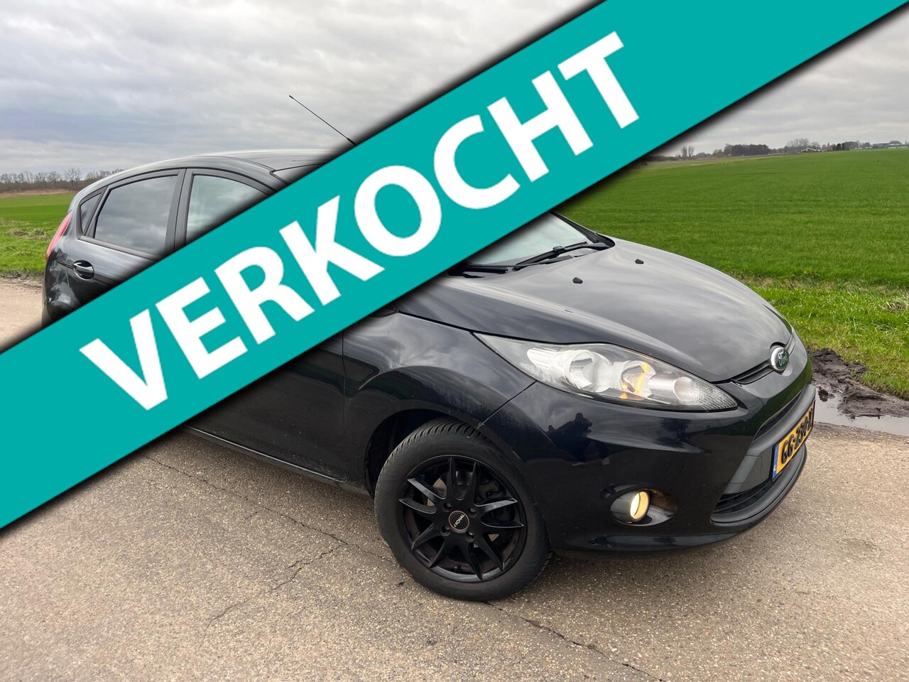 Ford Fiesta - 1.25 Ghia / 2011 - 5 Deurs - AutoWereld.nl