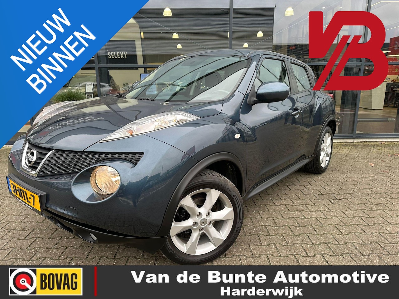 Nissan Juke - 1.6 Acenta * Cruise en climate control* - AutoWereld.nl