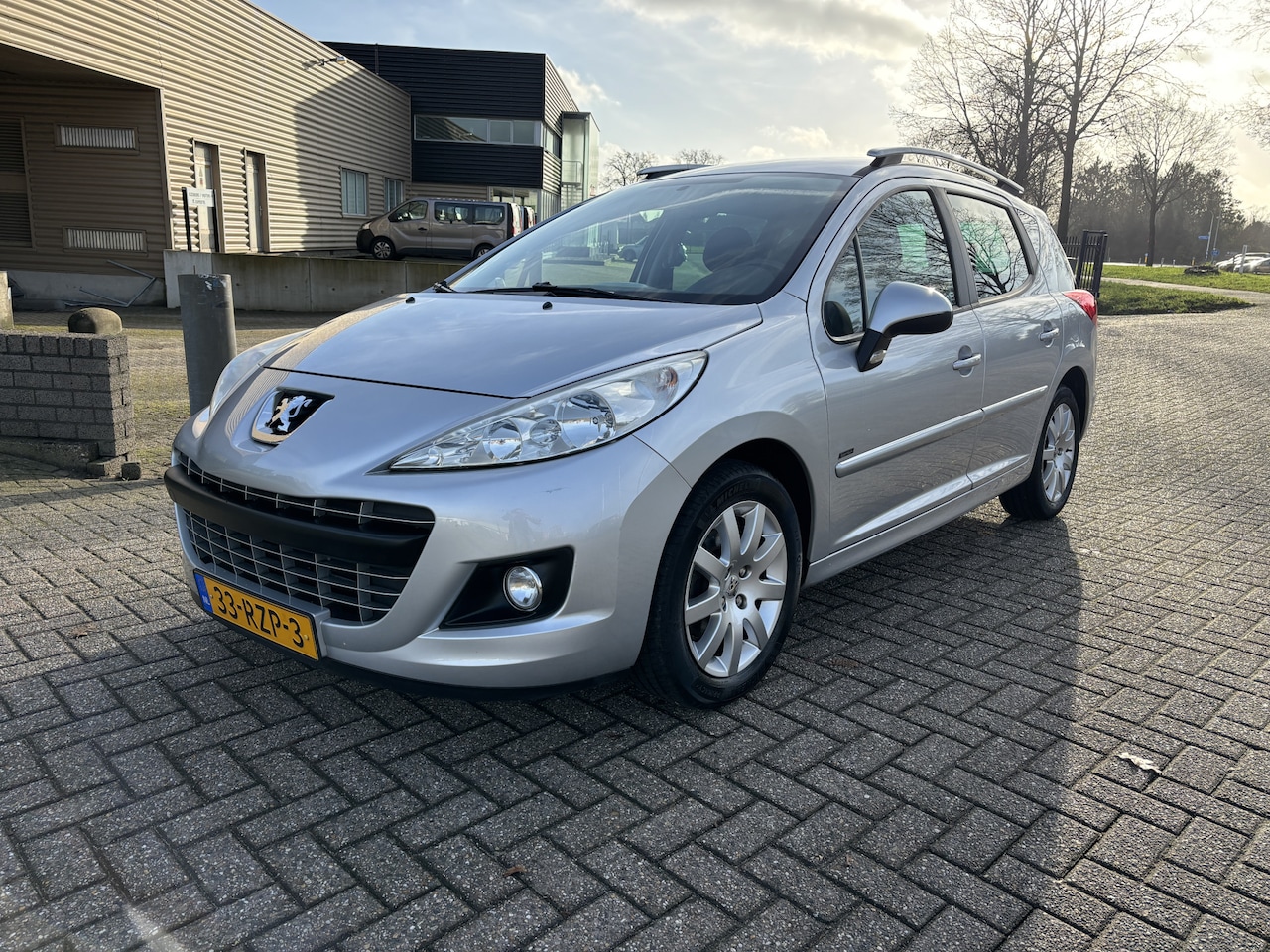 Peugeot 207 SW - 1.6 VTi Sportium [ airco,audio,cruise,lmv ] - AutoWereld.nl