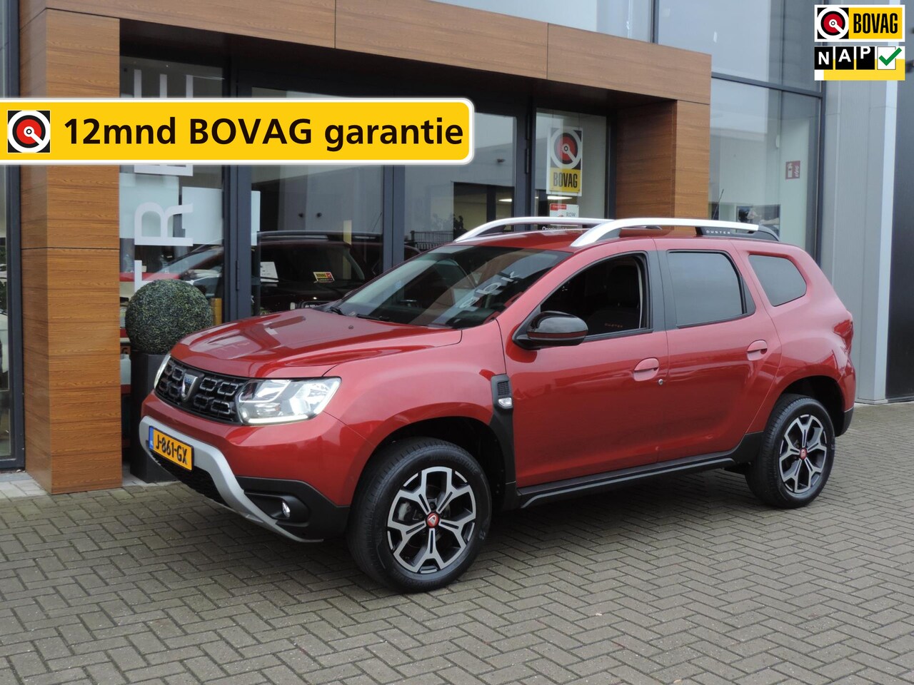 Dacia Duster - 1.3 TCe Tech Road 38.000km | ECC | 17” | Navi | Camera | Dodehoek | CarPlay | Keyless | Cr - AutoWereld.nl