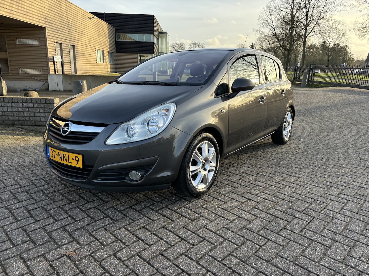 Opel Corsa - 1.2-16V Cosmo Automaat 5 deurs [ ecc,audio,cruise,lmv,pdc,trekhaak ] - AutoWereld.nl