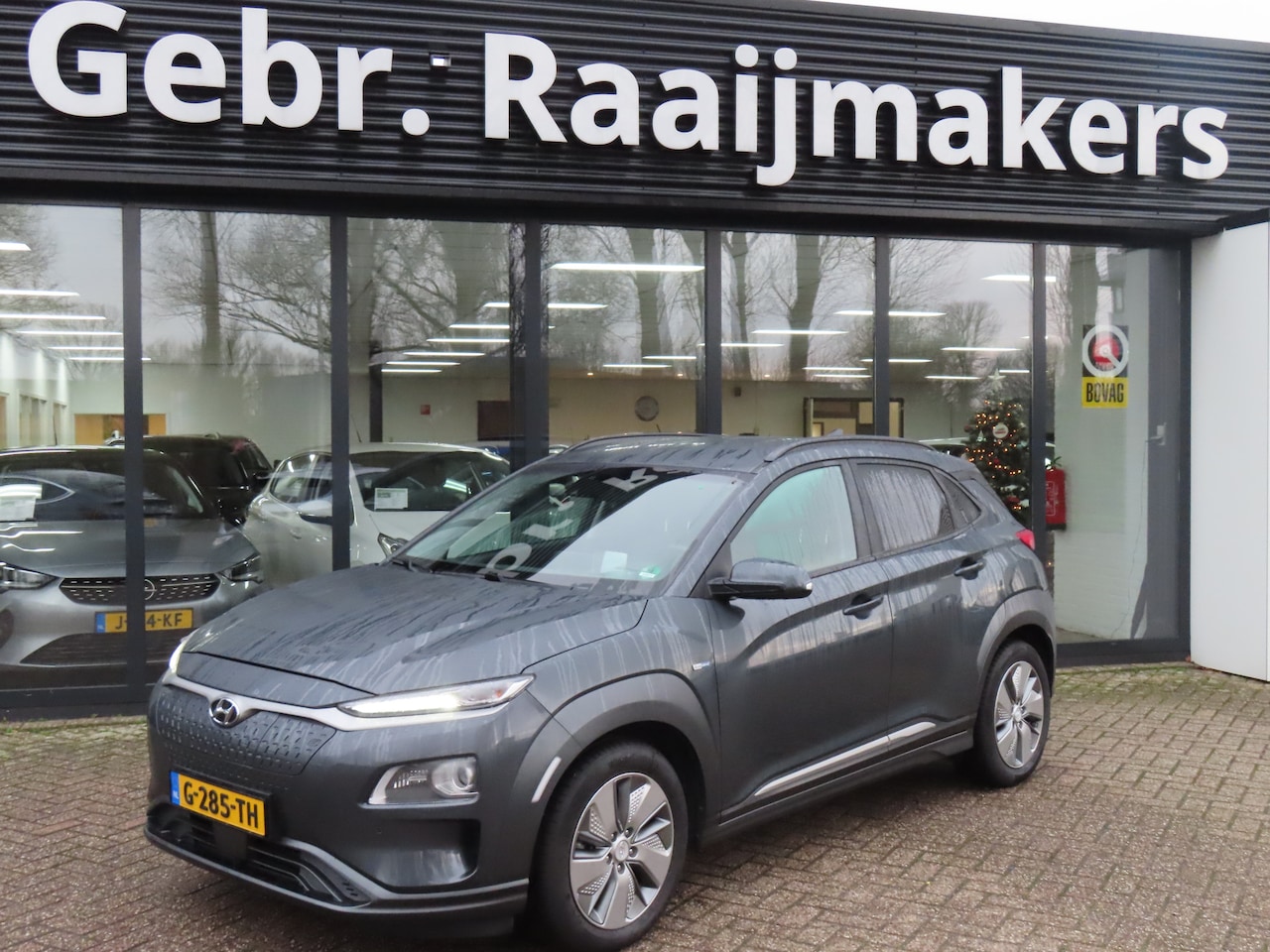 Hyundai Kona Electric - EV Premium 64 kWh*Leder*Navi*Camera*EXPORTPRIJS* - AutoWereld.nl