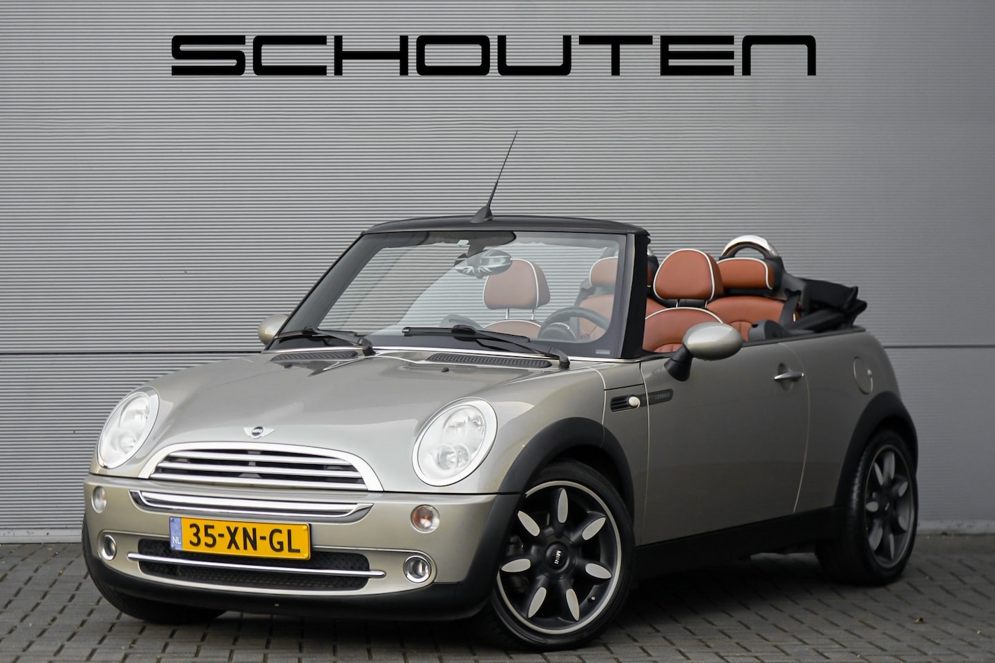 MINI Cabrio - Mini 1.6 One Sidewalk Leder 17" PDC - AutoWereld.nl