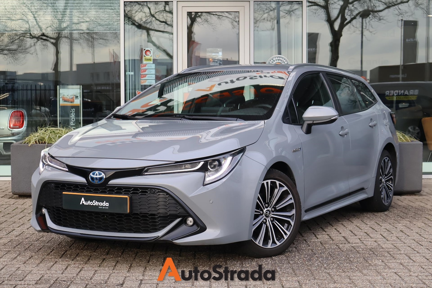 Toyota Corolla Touring Sports - 1.8 Hybrid 122pk CVT | Head-Up | Camera | Navi | Keyless | LED - AutoWereld.nl