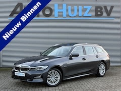 BMW 3-serie Touring - 320e Luxury Line Head Up ACC Innovatie pakket Laser licht Panoramadak Trekhaak