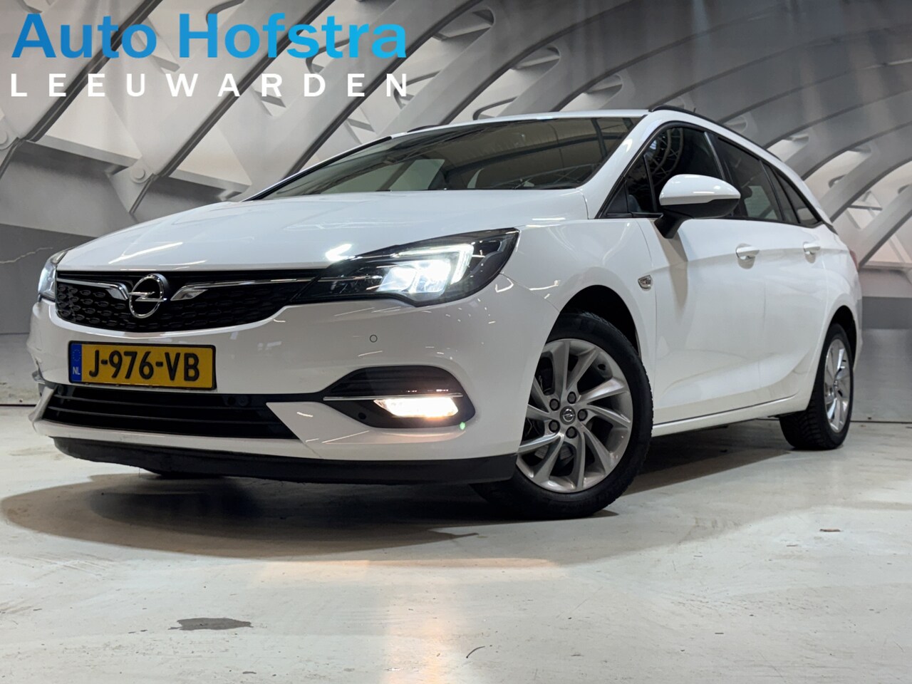 Opel Astra Sports Tourer - 1.2 Turbo Edition LED CAMERA 2X-PDC LMV NAVI CLIMA CRUISE - AutoWereld.nl