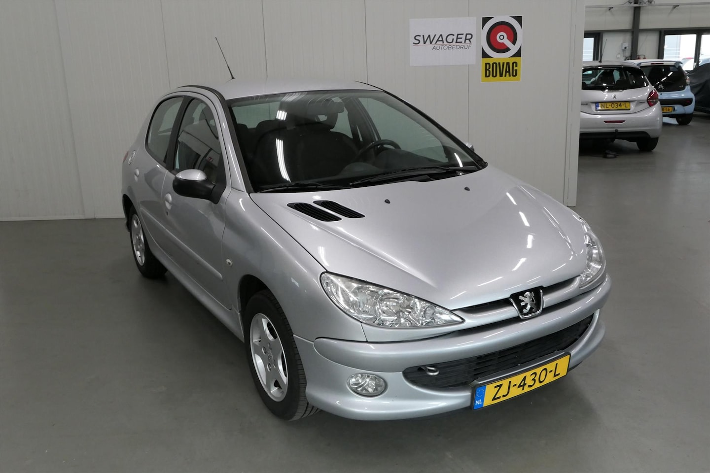 Peugeot 206 - 1.4 5D Generation( met Cruise) - AutoWereld.nl