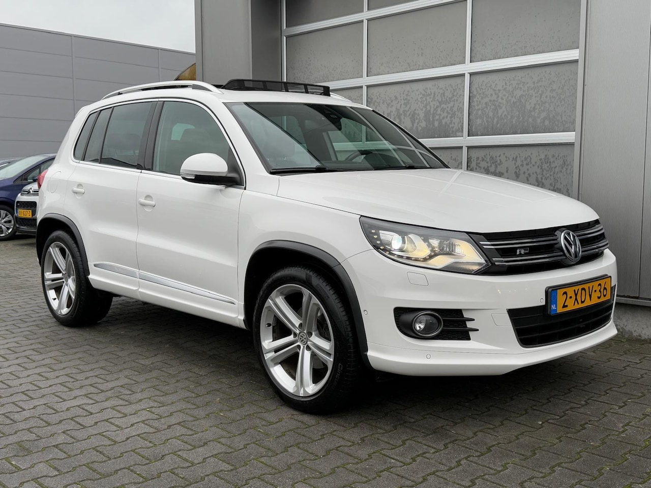 Volkswagen Tiguan - 1.4 TSI R-Line Edition|Xenon|PDC|Trekh|Cruise - AutoWereld.nl