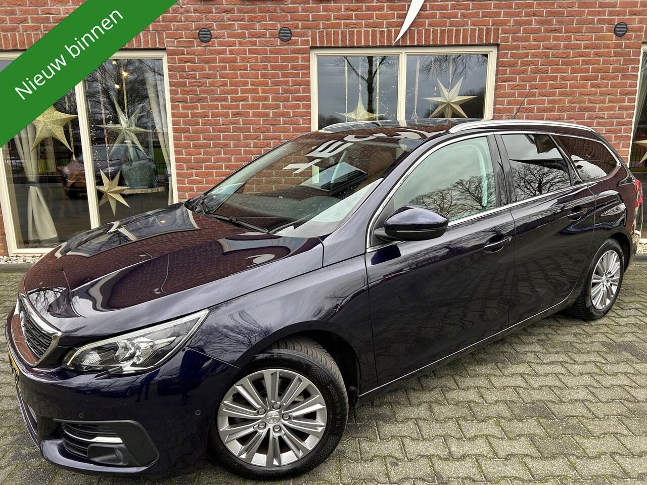 Peugeot 308 SW - 1.2 PureTech Blue Lease Premium Automaat / AFN.TREKHAAK / PANO / LEER / CAMERA - AutoWereld.nl