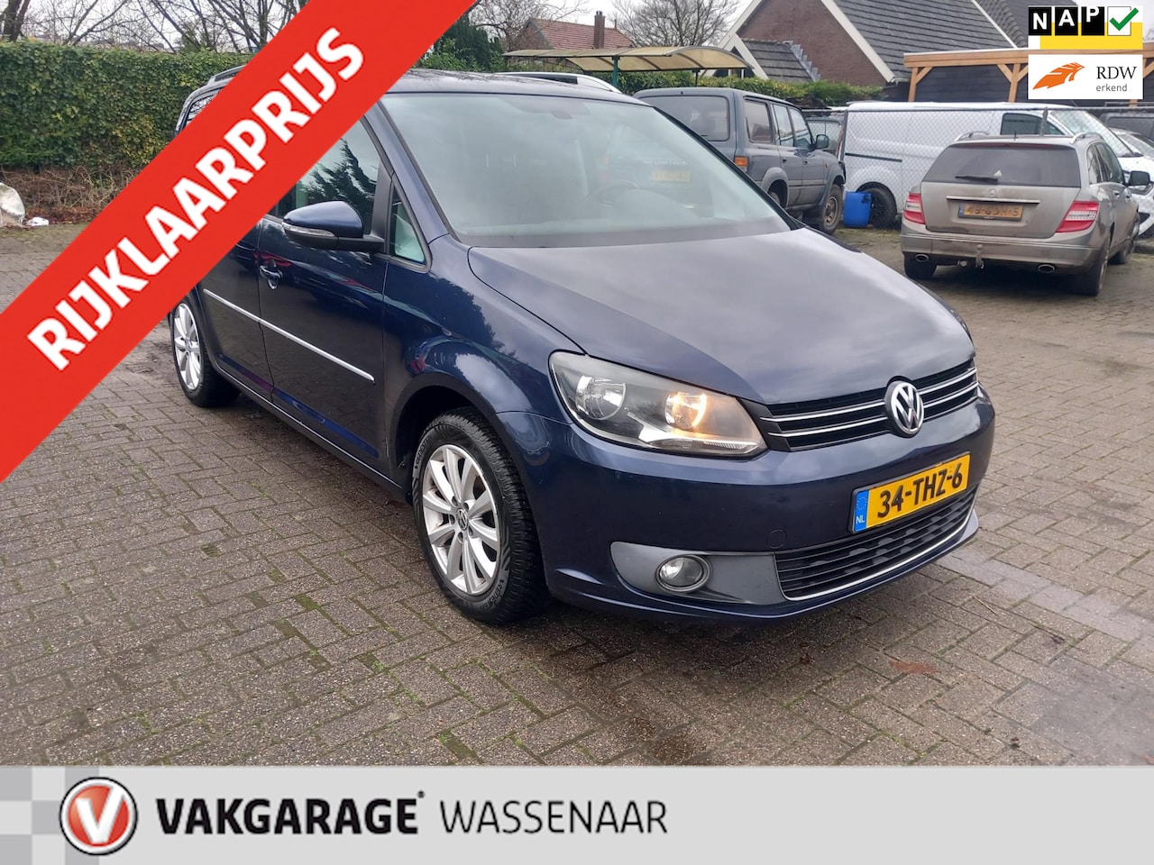 Volkswagen Touran - 1.2 TSI Highline BlueMotion trekh navi - AutoWereld.nl