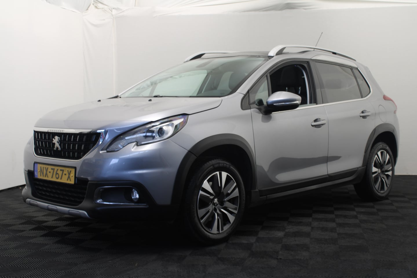 Peugeot 2008 - 1.2 PureTech Allure |Pano|Navi| - AutoWereld.nl