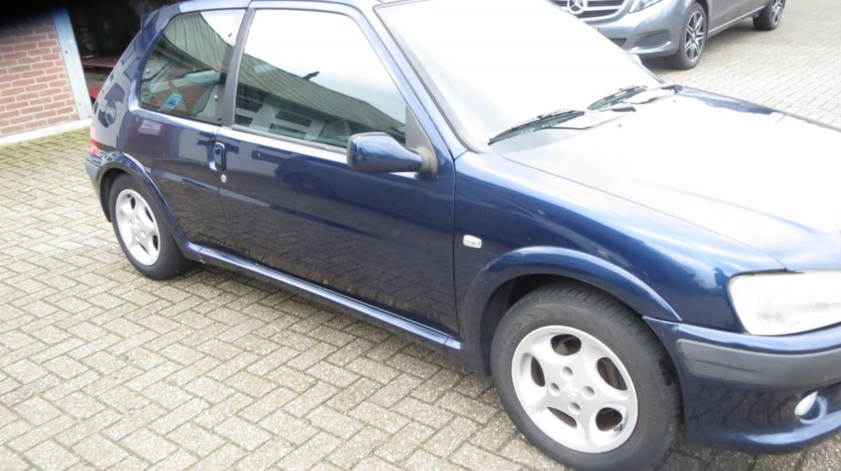 Peugeot 106 - 1.4  sport stuurbekrachtiging cv LM velg - AutoWereld.nl