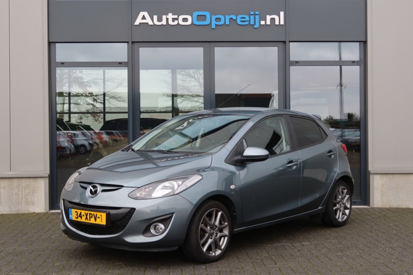 Mazda 2 - 1.3 BIFUEL PLG G3 Navigator GT 5drs. Airco, NAVI, Cruise, Stoelv - AutoWereld.nl