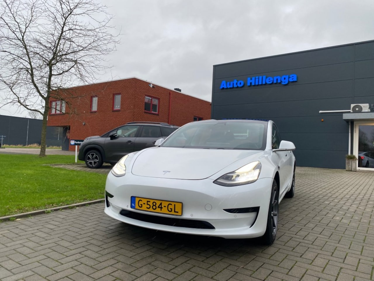 Tesla Model 3 - STANDARD RANGE PLUS RWD - AutoWereld.nl