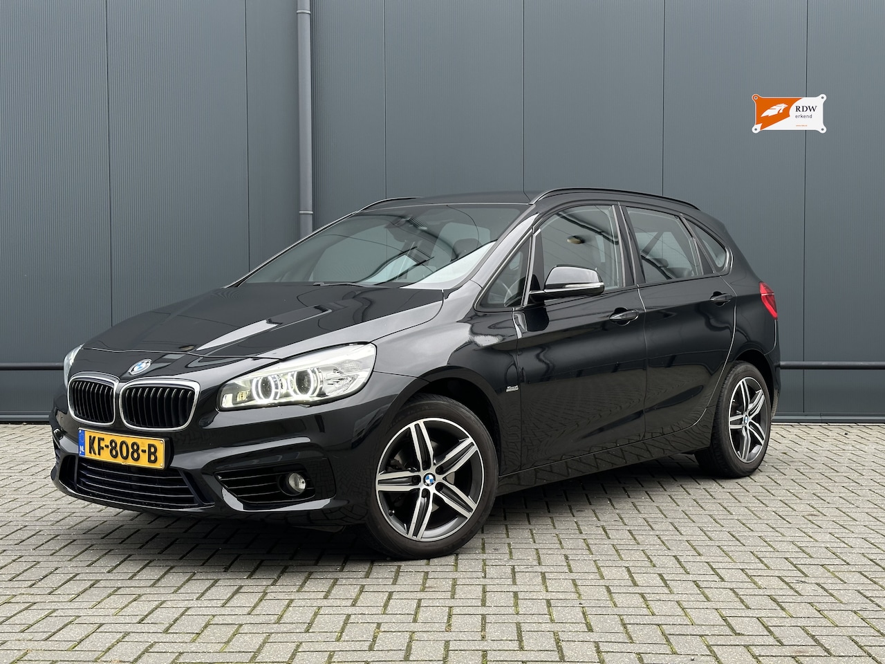 BMW 2-serie Active Tourer - 218i Centennial High Executive HUD - NAVI - CAMERA - TREKHAAK - AutoWereld.nl