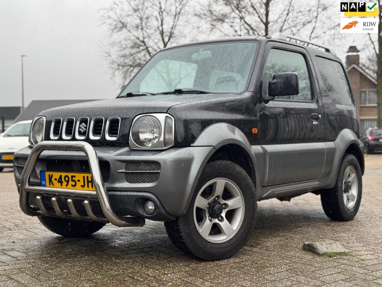 Suzuki Jimny - 1.3 JX AIRCO 4X4 LEER STOELVERW. - AutoWereld.nl