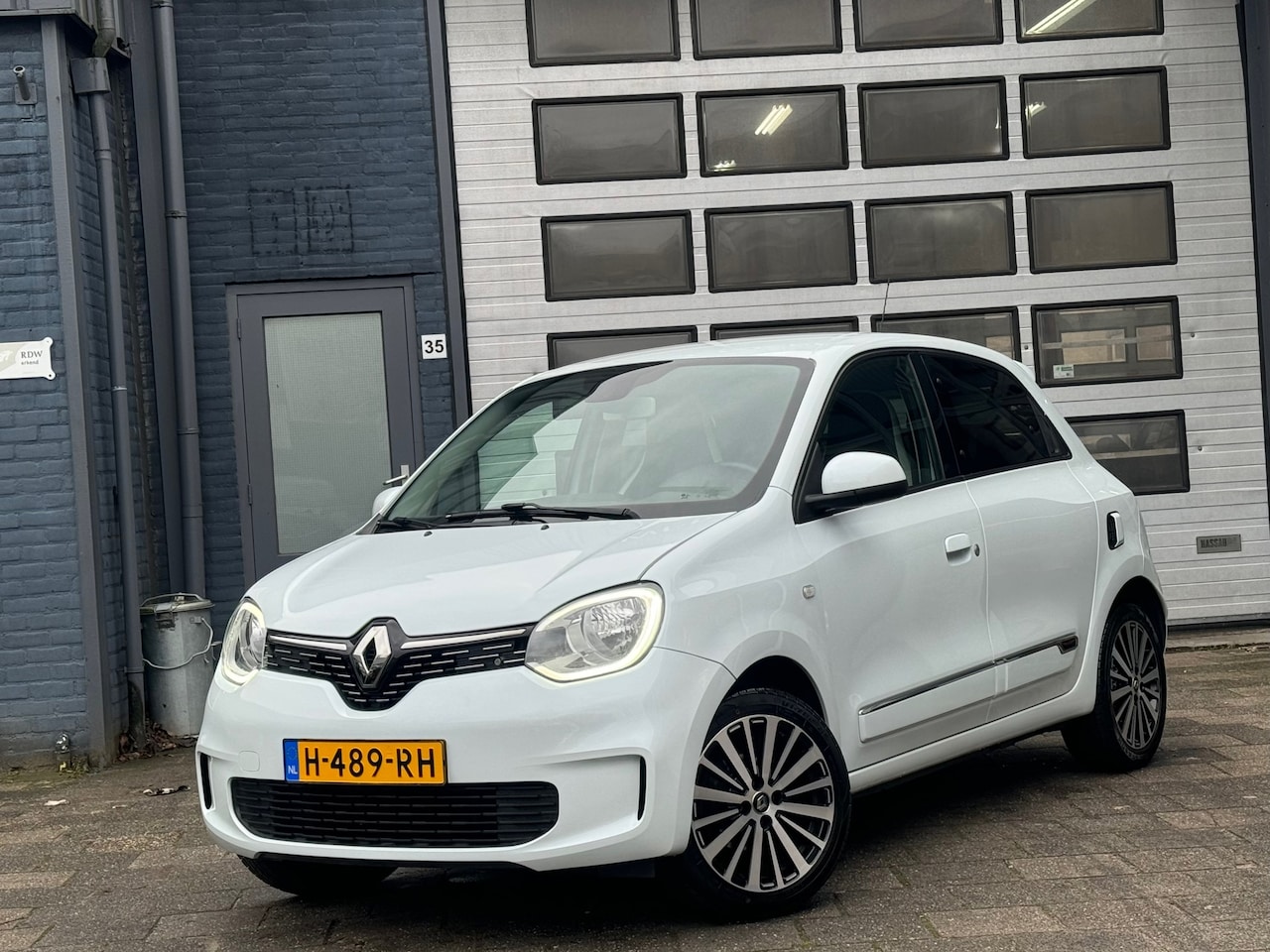 Renault Twingo - 1.0 SCe Intens | Clima | Cruise | Leer | N.A.P - AutoWereld.nl