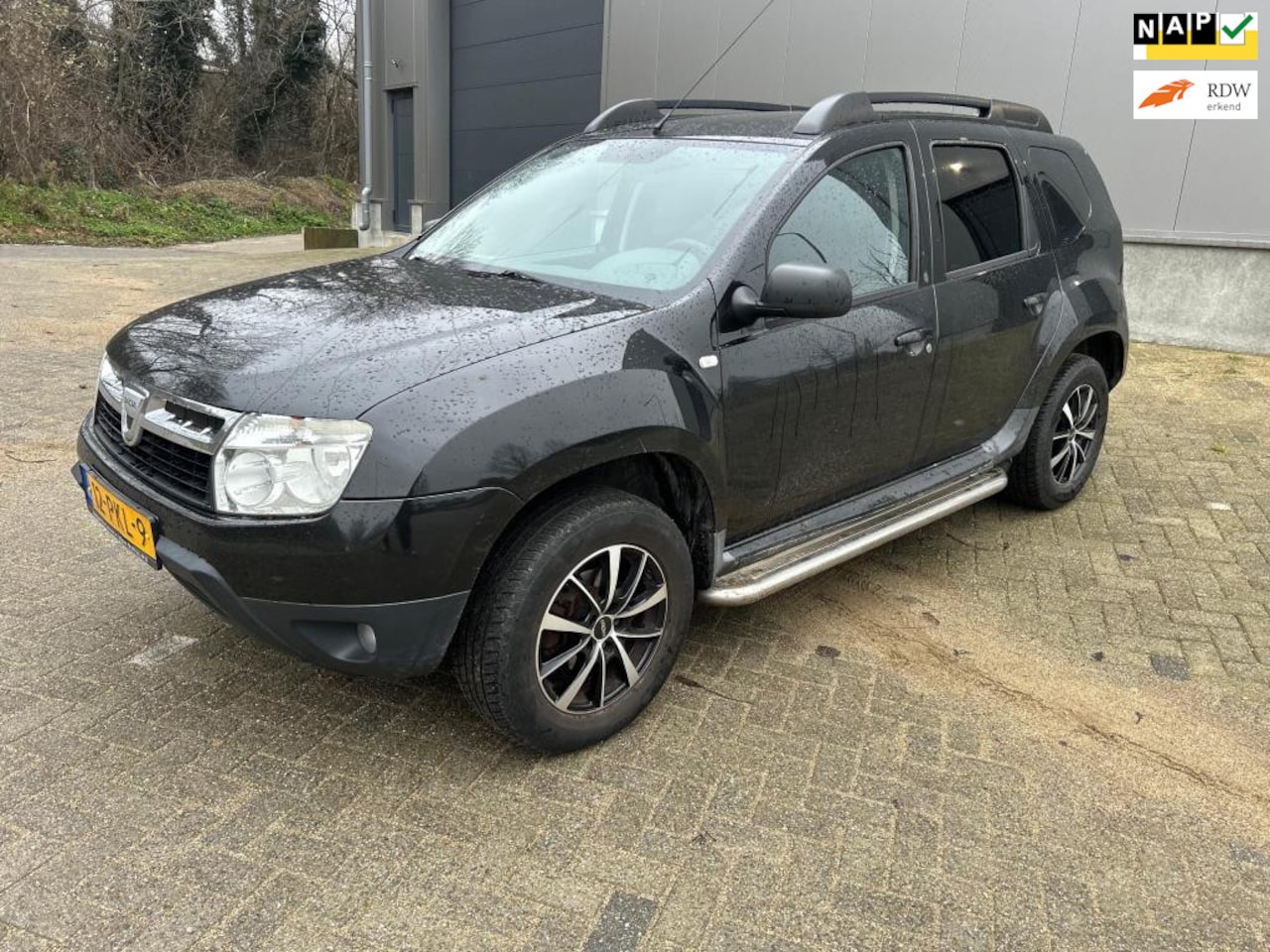 Dacia Duster - 1.6 Lauréate 2WD Airco DAB+ Trekhaak - AutoWereld.nl