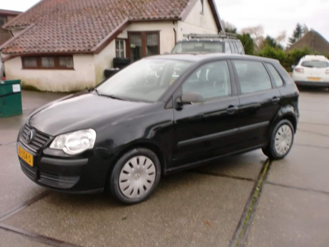 Volkswagen Polo - 1.2 GOHL 5DRS AIRCO ZWART KM151 4XELRAMEN - AutoWereld.nl