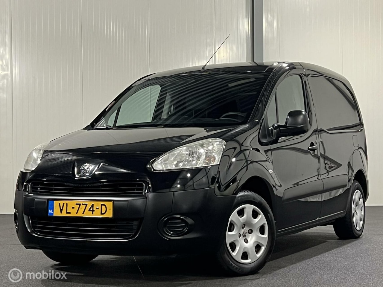 Peugeot Partner - 120 1.6 HDI [ NAP 1e eig. trekhaak airco ] - AutoWereld.nl