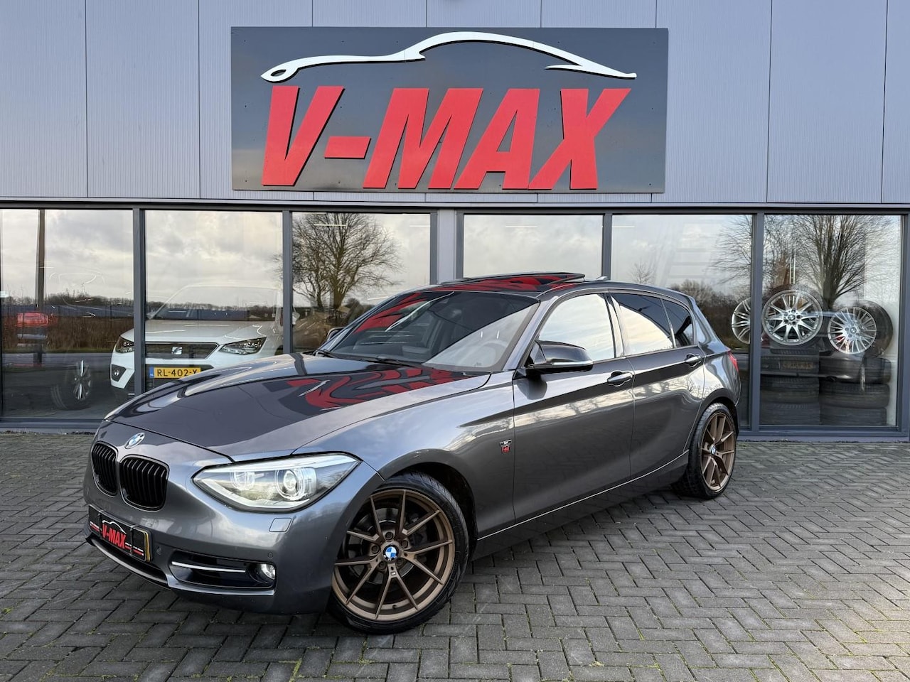 BMW 1-serie - 118i AUT Sport Edit Schuifdak Xenon Naviprof - AutoWereld.nl