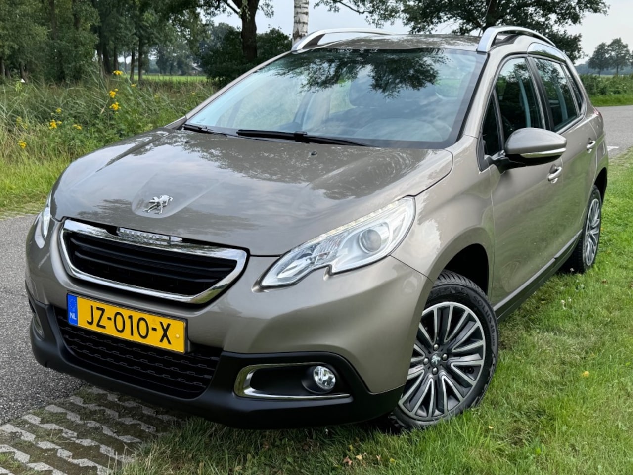 Peugeot 2008 - 1.2 PureTech Blue Lion / 12DKM / 2016 / 1e EIGENAAR - AutoWereld.nl