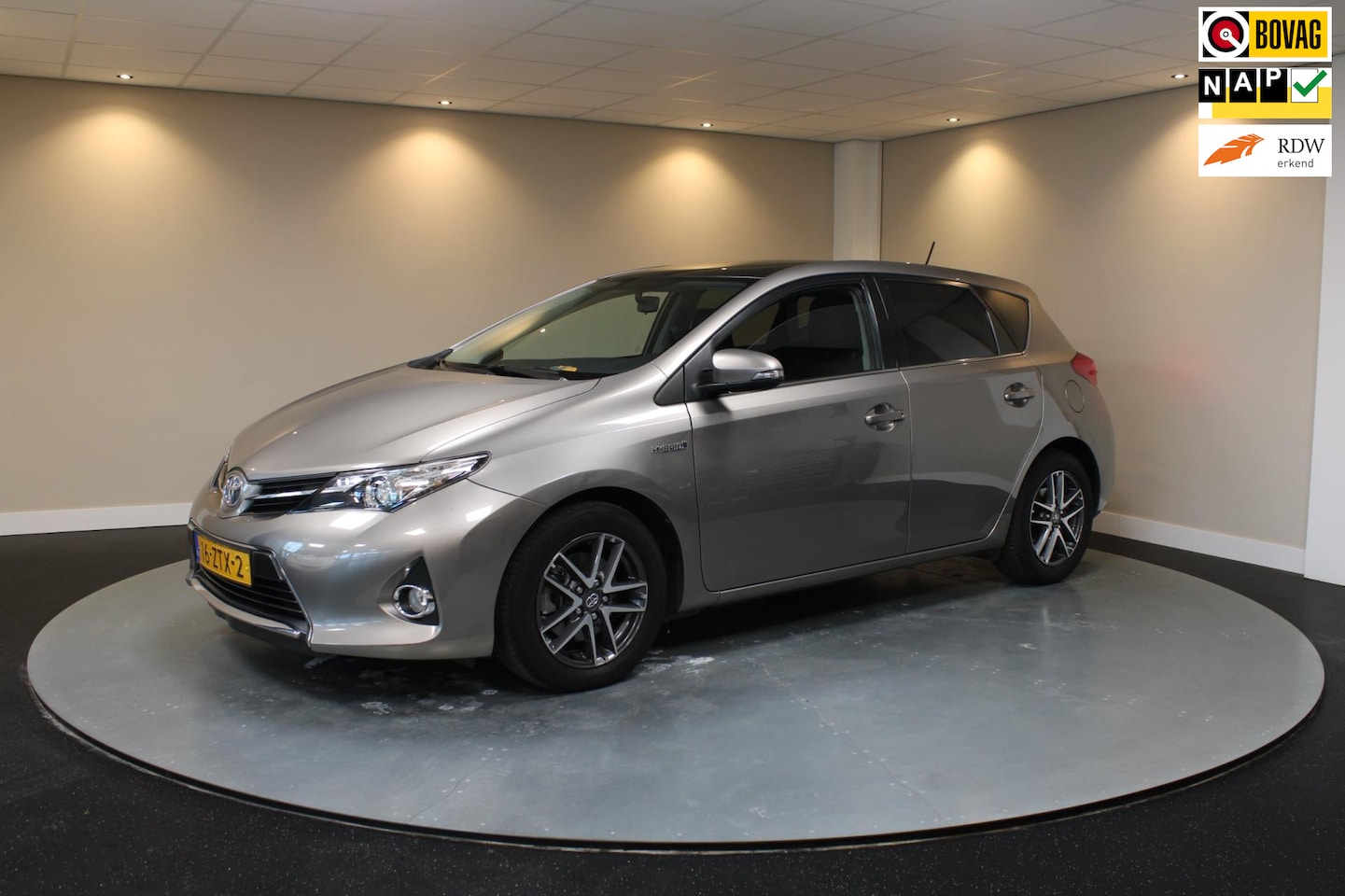 Toyota Auris - 1.8 Hybrid *Panodak* Navi|Camera|Cruise|NAP - AutoWereld.nl