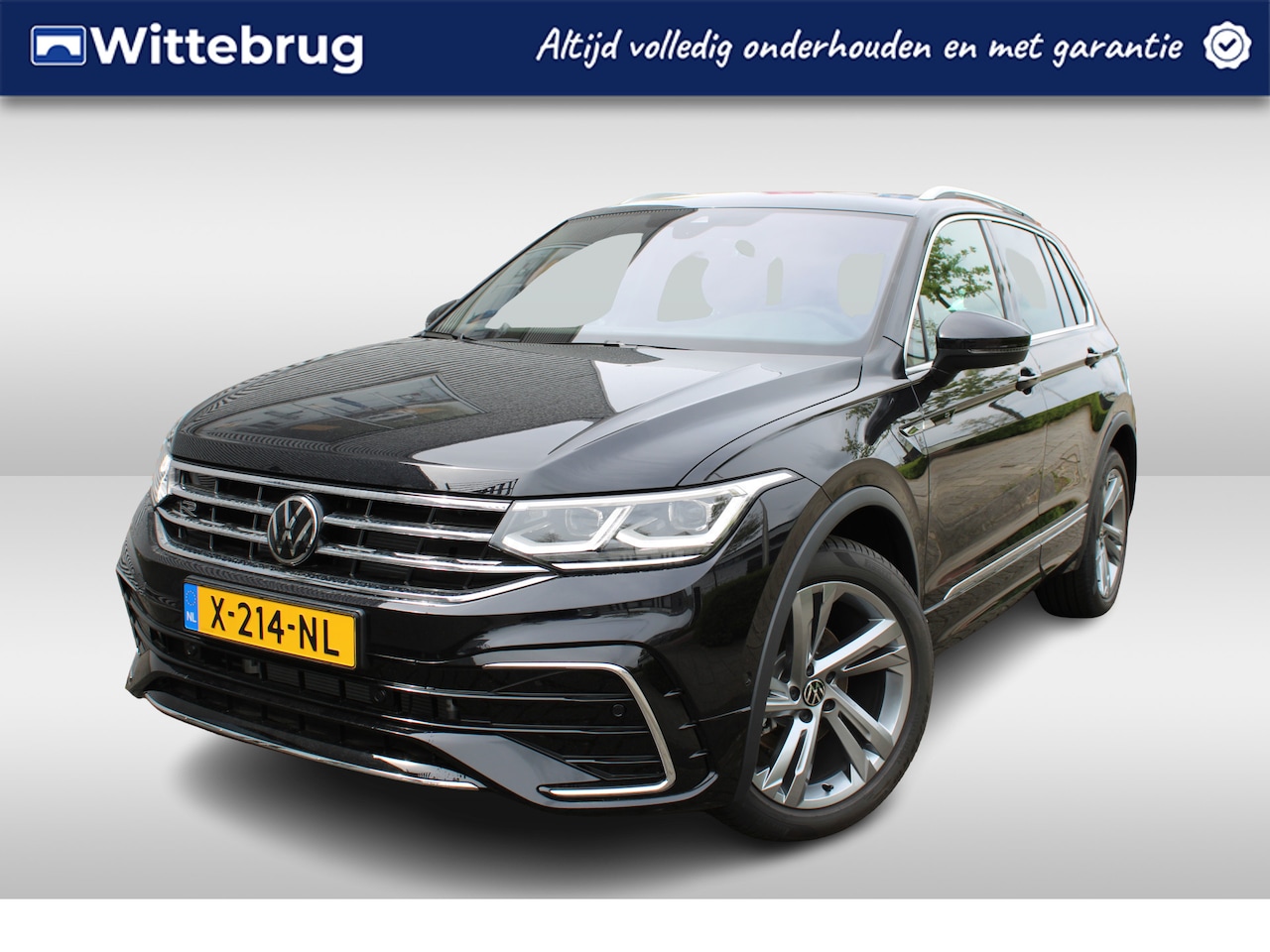 Volkswagen Tiguan - 1.5 TSI R-Line Business Advance DSG Automaat Panoramadak / Navigatie / R-Line  /  Trekhaak - AutoWereld.nl