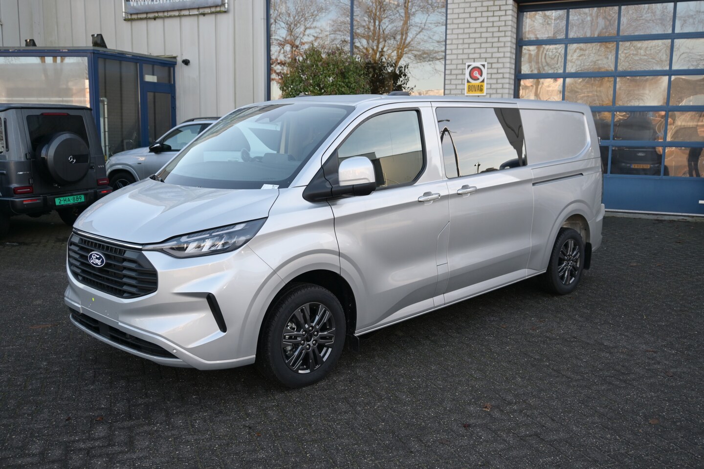 Ford Transit Custom - 300L 2.0 TDCI L2H1 Limited DC Driver Assistance Pack Premium, Middenconsole, Inklapbare tr - AutoWereld.nl