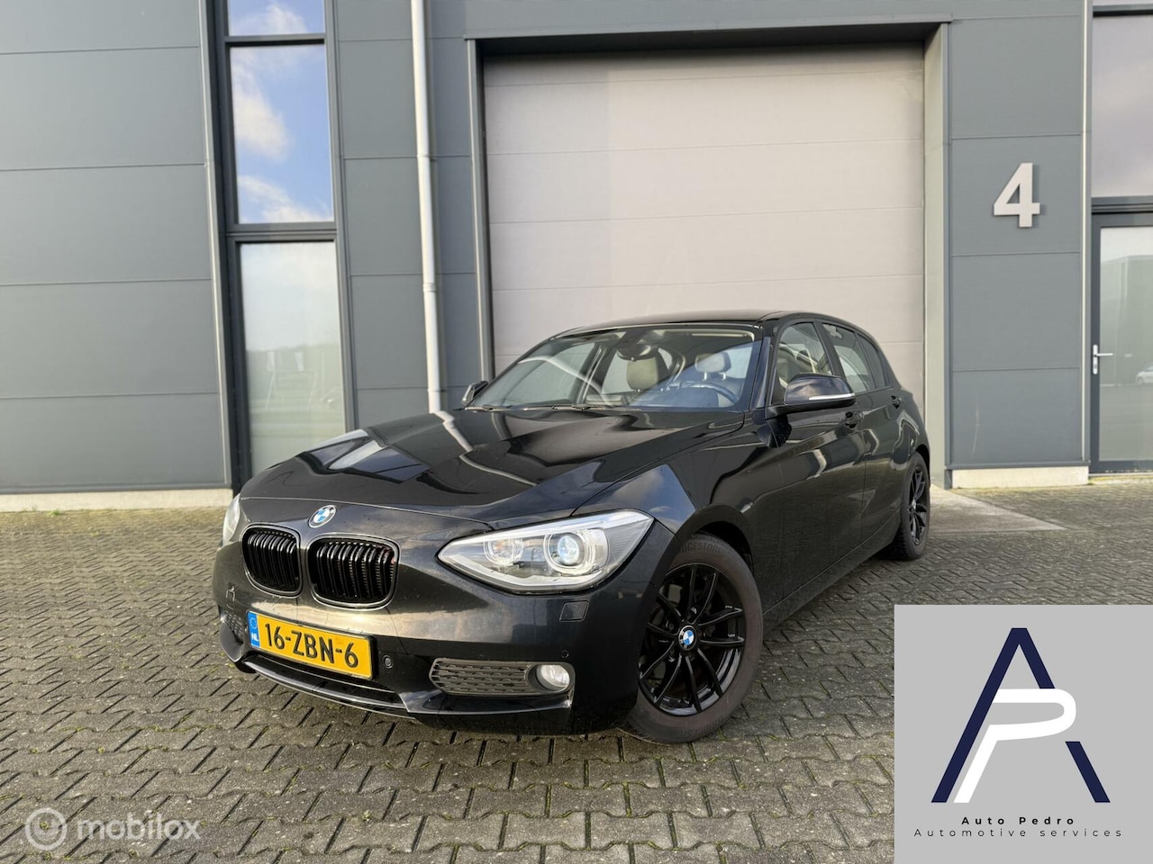 BMW 1-serie - 116i Business Leder AUTOMAAT Zwart 5-deurs - AutoWereld.nl