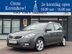 Kia Cee'd Sporty Wagon - 1.4 CVVT X-ecutive navigatie airco elktr pakket pdc achter lmv 16 inch 2e eigenaar dealer