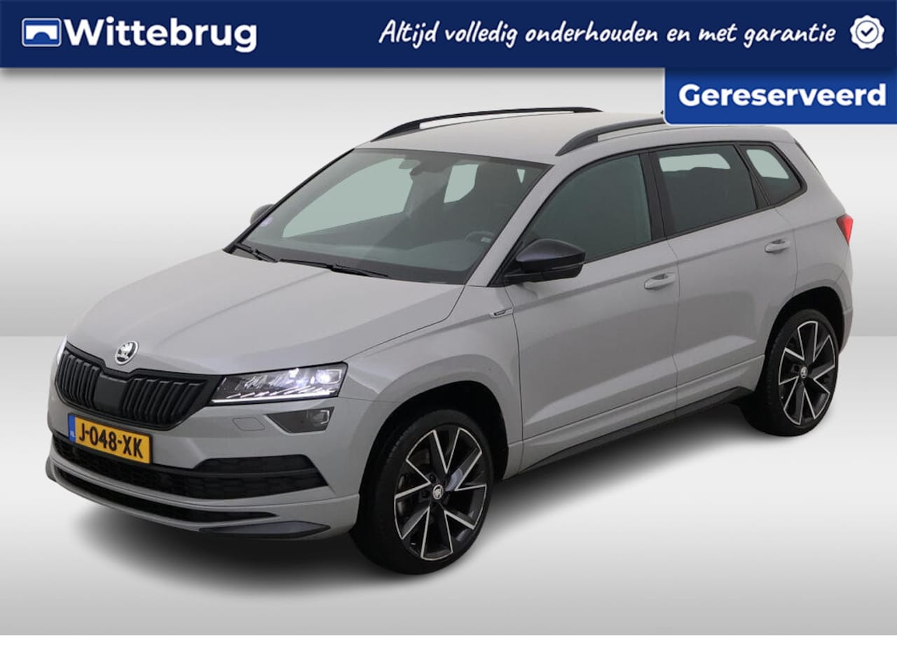 Skoda Karoq - 1.5 TSI ACT 150pk Sportline Business / NAVI / APP.Connect / CAMERA / Elektr. Trekhaak / 19 - AutoWereld.nl