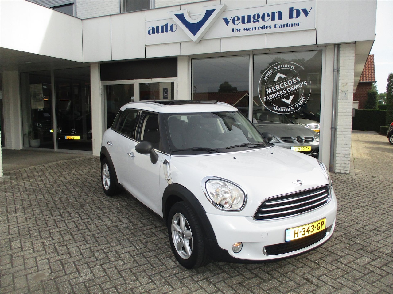 MINI Countryman - 1.6 72KW COUNTRYMAN Edition / Panoramadak - AutoWereld.nl