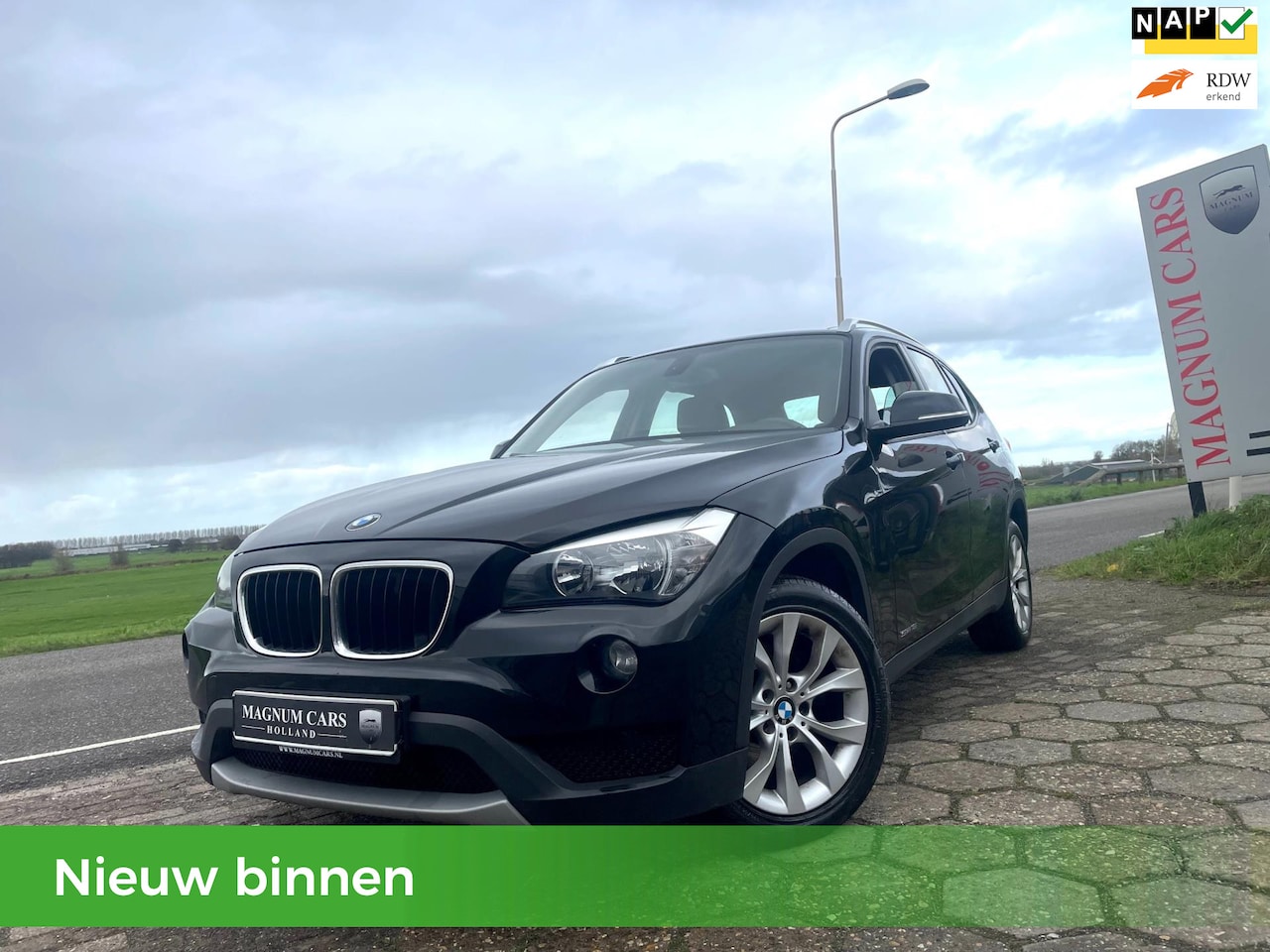 BMW X1 - SDrive18i Executive 5D 6Bak Navi Trekhaak Velgen - AutoWereld.nl