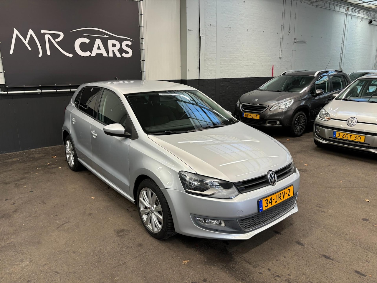 Volkswagen Polo - 1.4-16V Highline Climate Control/Navi/Cruise Control - AutoWereld.nl