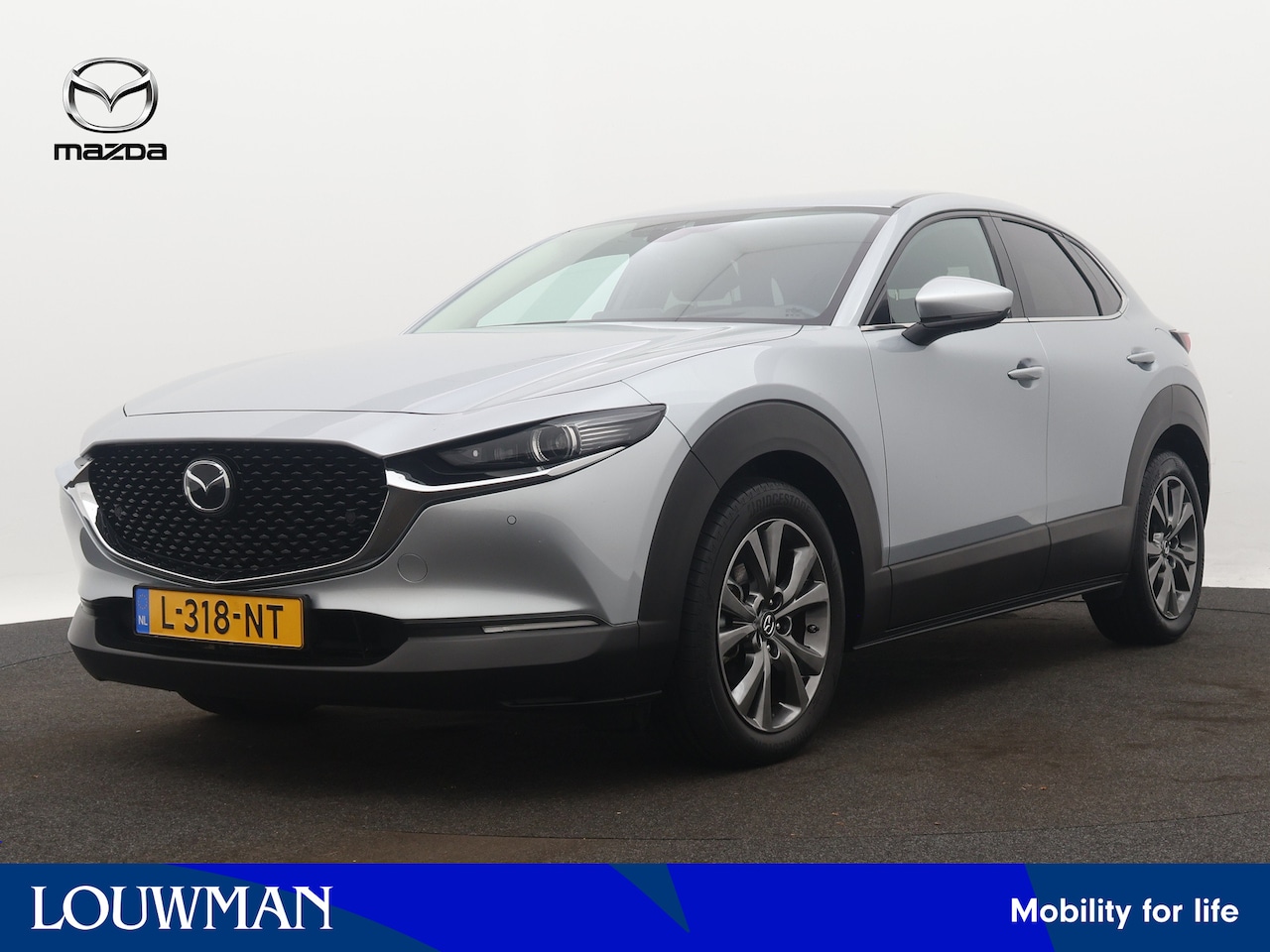 Mazda CX-30 - 2.0 e-SkyActiv-X M Hybrid Luxury | Navigatie | Camera | Parkeersensoren | Stoel en stuurwi - AutoWereld.nl