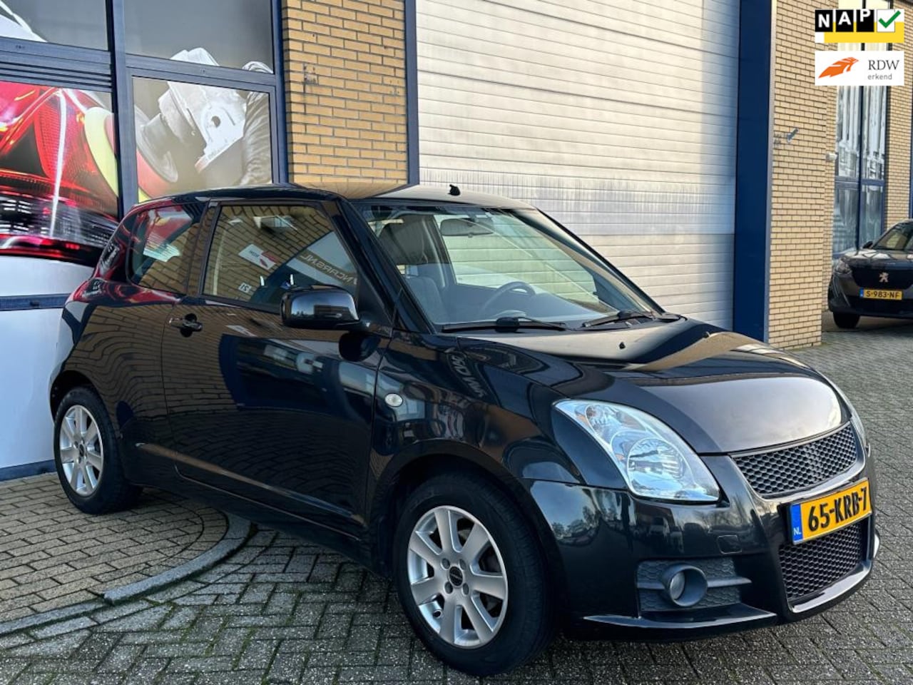 Suzuki Swift - 1.3 Base 1.3 Base, Apk, Airco, Lichtmetaal, Elektrische ramen, all season banden, inruil mogelijk. - AutoWereld.nl