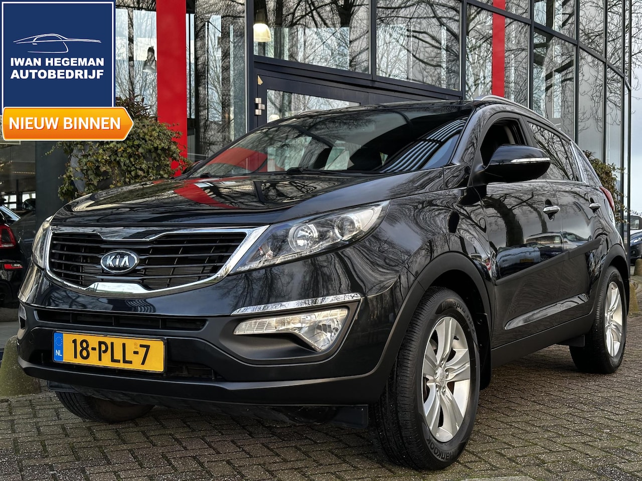 Kia Sportage - 2.0 X-ecutive Plus Pack | Navi | ECC | Trekhaak | LM Velgen | Cruise Control - AutoWereld.nl