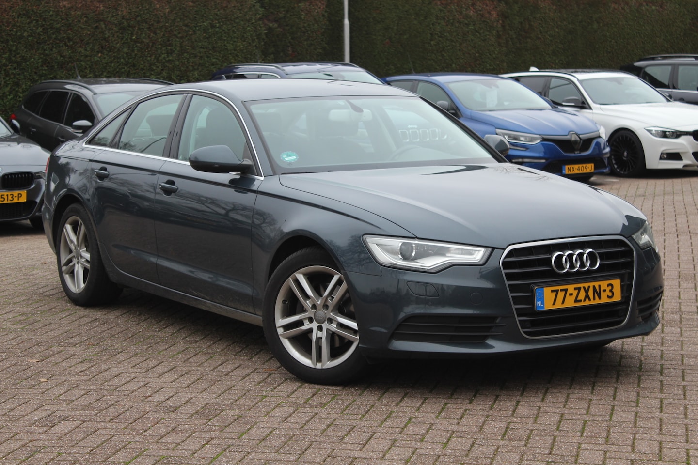 Audi A6 Limousine - 2.0 TFSI Business Edition / Navigatie / Parkeerhulp V+A / 20'' / Xenon / Bluetooth / Cruis - AutoWereld.nl