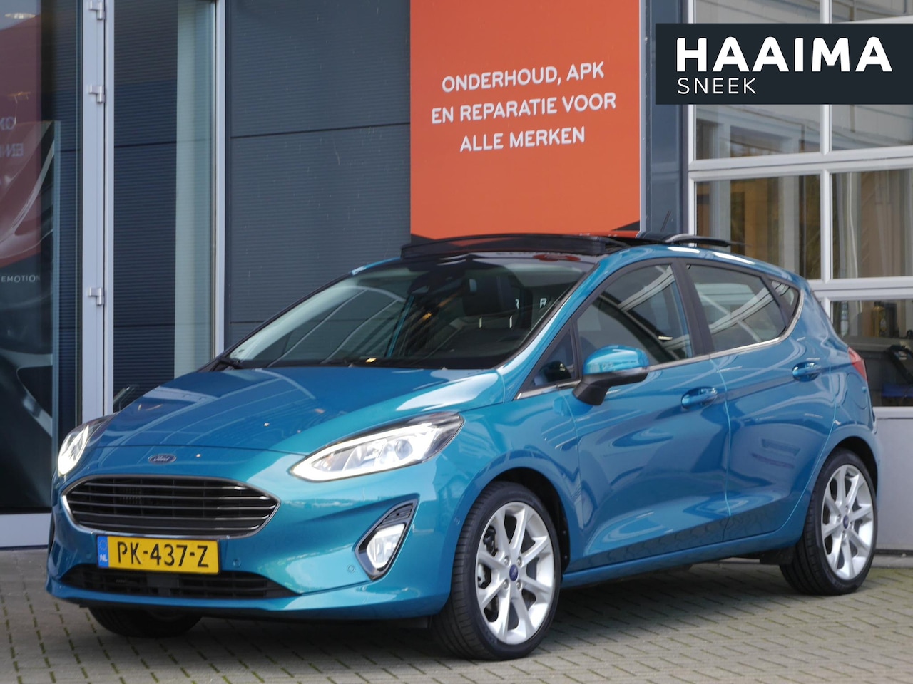 Ford Fiesta - 1.0 EcoBoost Titanium | Schuif/kantel dak | Lichtmetalen velgen | Keyless entry | Camera | - AutoWereld.nl