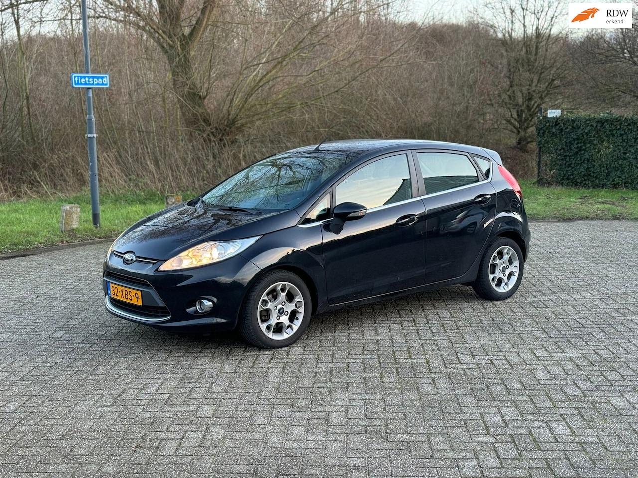 Ford Fiesta - 1.6 TDCi ECOnetic Titanium CRUISE I PDC I NETTE AUTO - AutoWereld.nl