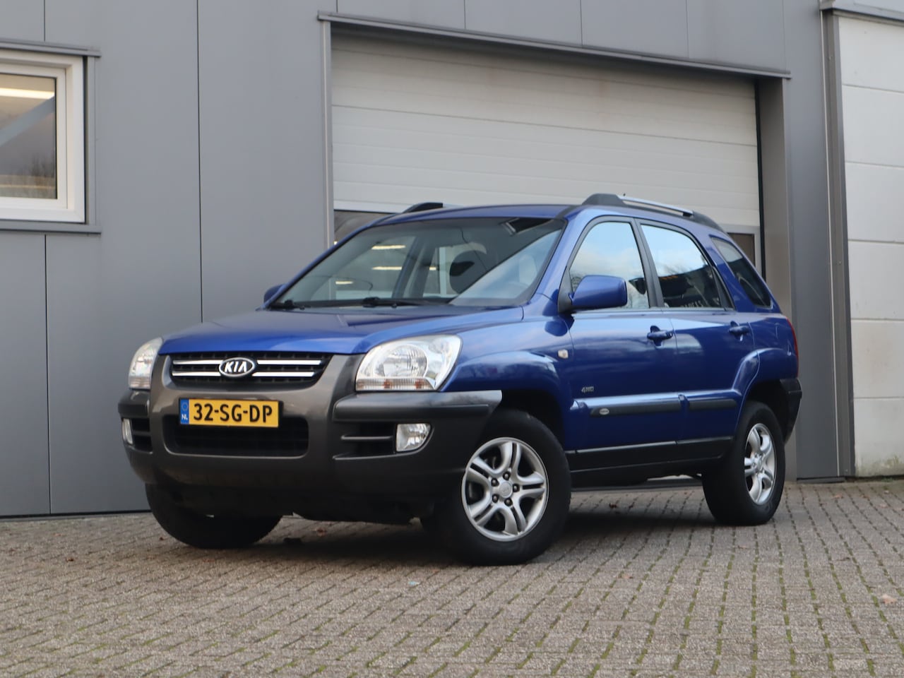 Kia Sportage - 2.0 CVVT 4WD Comfort / Trekhaak - AutoWereld.nl